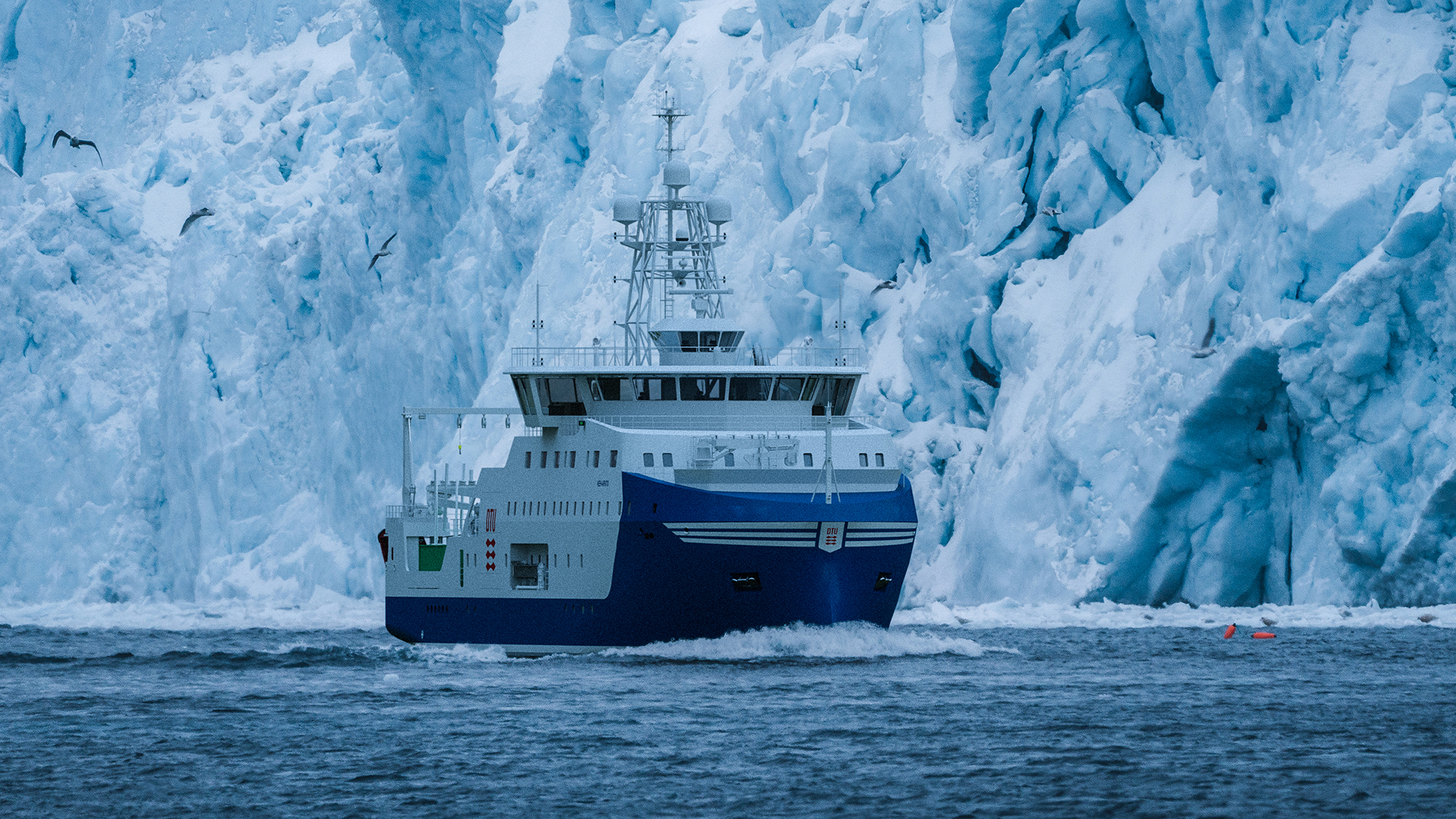 Rendering of Dana V ©Graphics: Knud E. Hansen. The background image is kindly provided by Visit Greenland, and the photo is by Jason C. Hill. All rights reserved. Rendering of Dana V