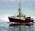 Fishing boat surrounded by ice in Arctic waters